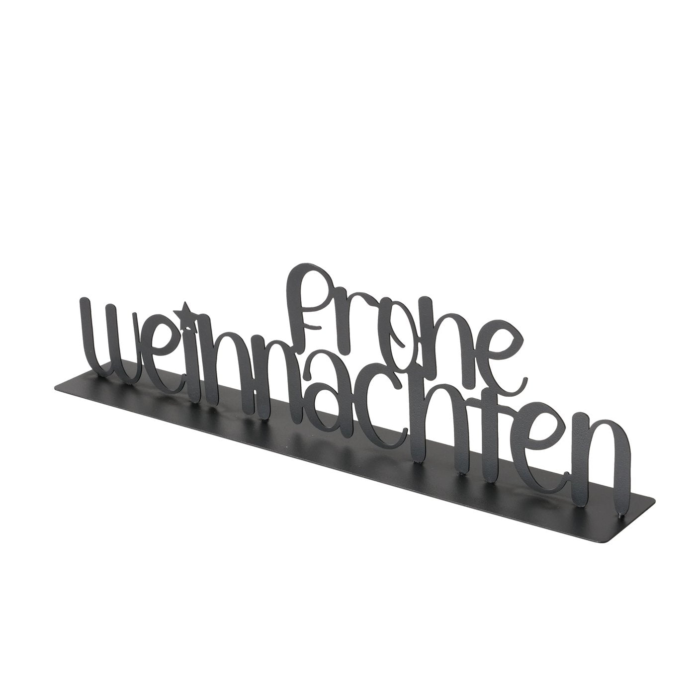 Schwarzer metallener Schriftzug „Frohe Weihnachten“ als dekorativer Aufsteller im modernen, matten Design